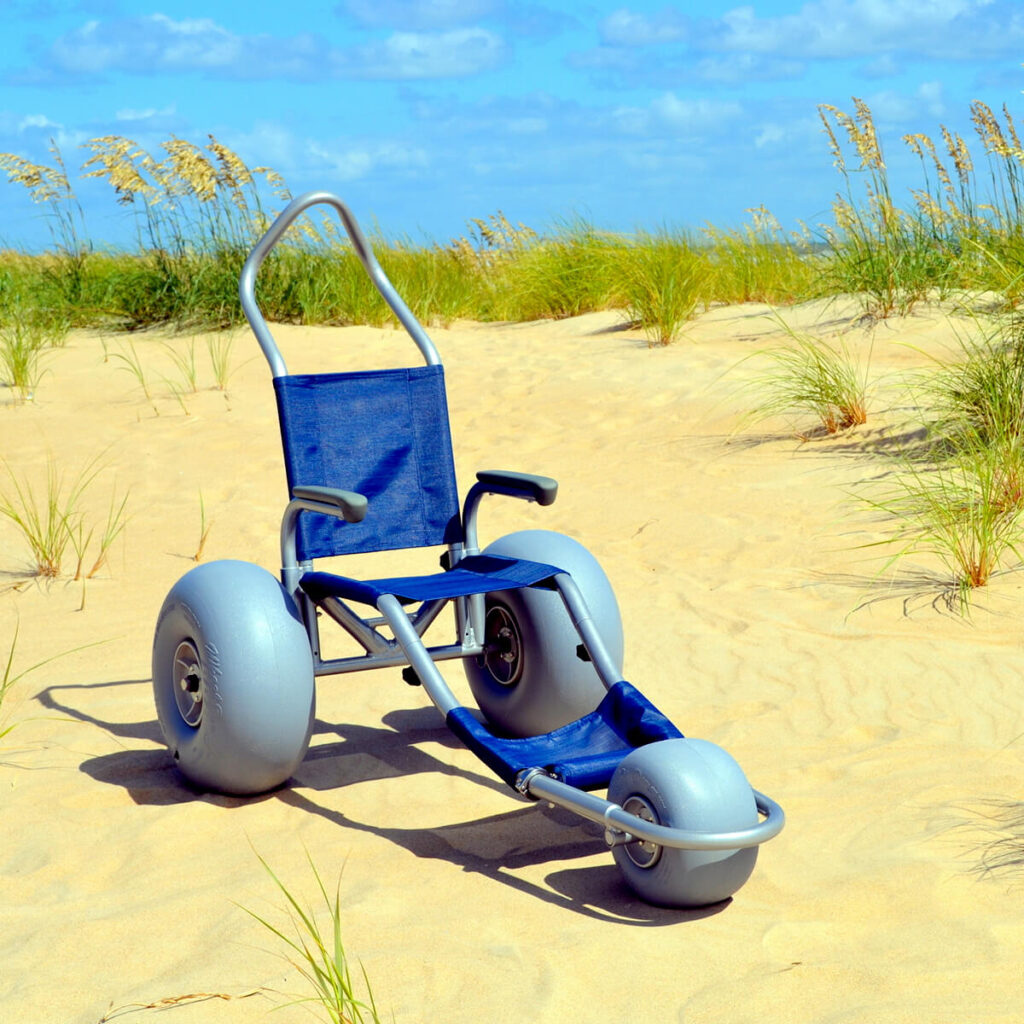 Sand Rider beach wheelchair pictured on the sand